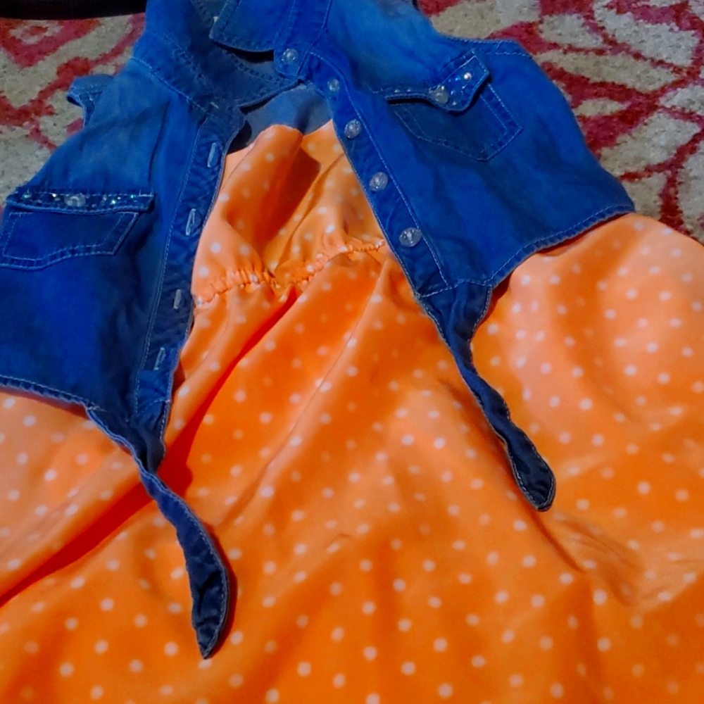 Jean jacket with orange and white polka dotted dress